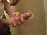 Long cock with cum into condom.