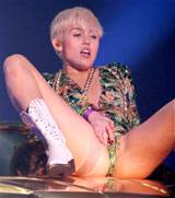 Pictures of Miley Ray Cyrus masturbating onstage during her â€˜Bangerz ...