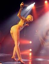 Miley Cyrus Gives Blowup Doll Blow Job